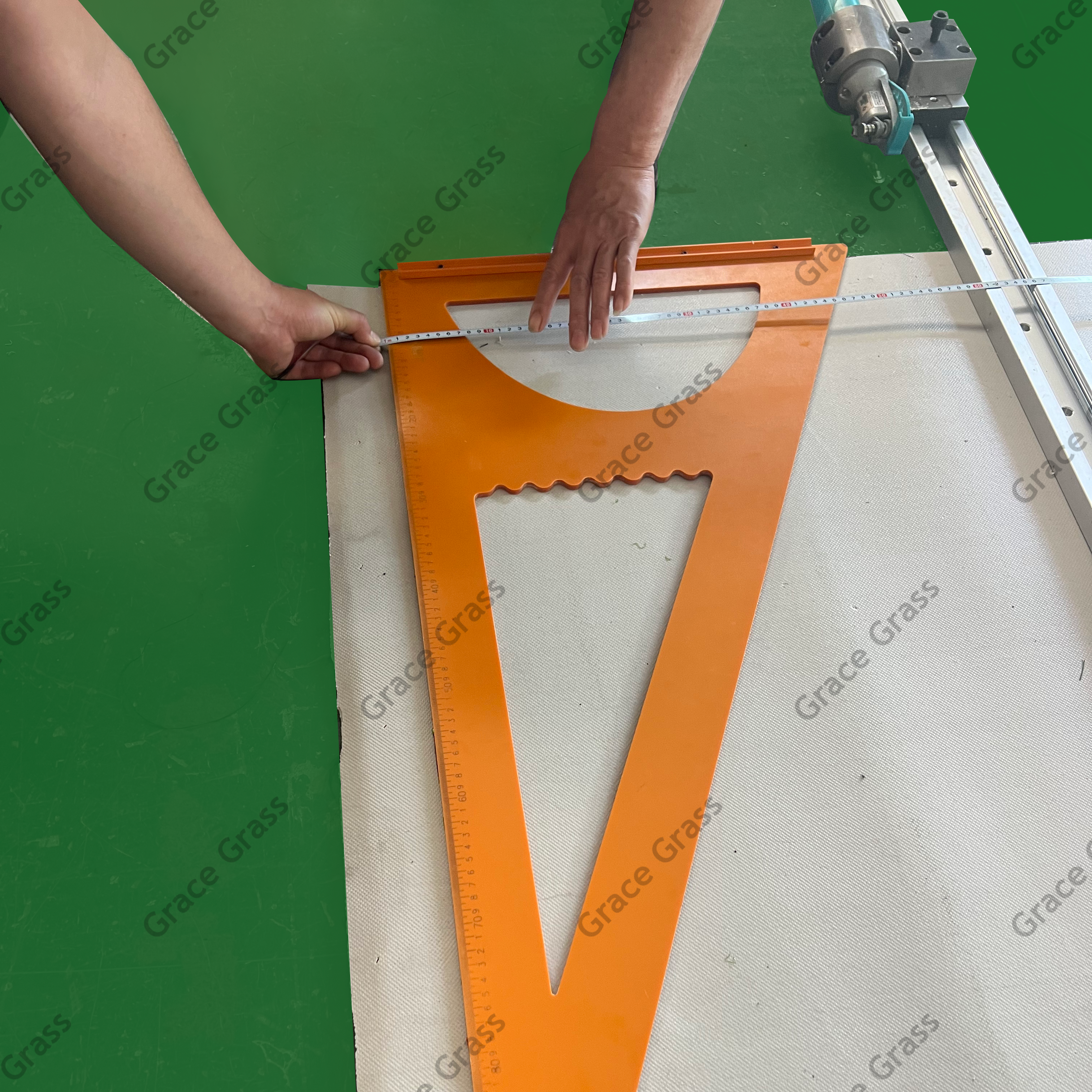 Measuring and marking the perpendicular edge.