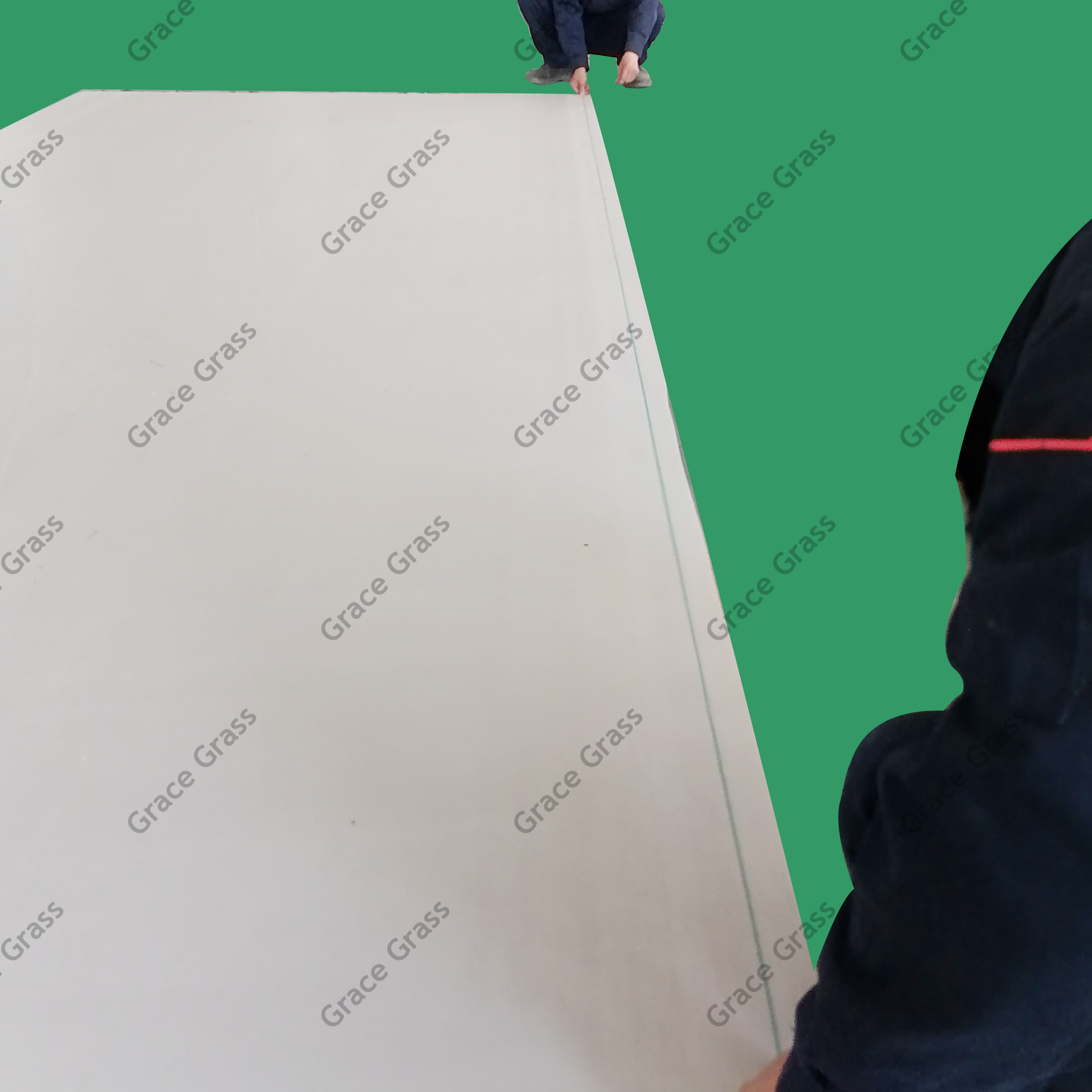 Snapping a chalk line for accurate cutting.
