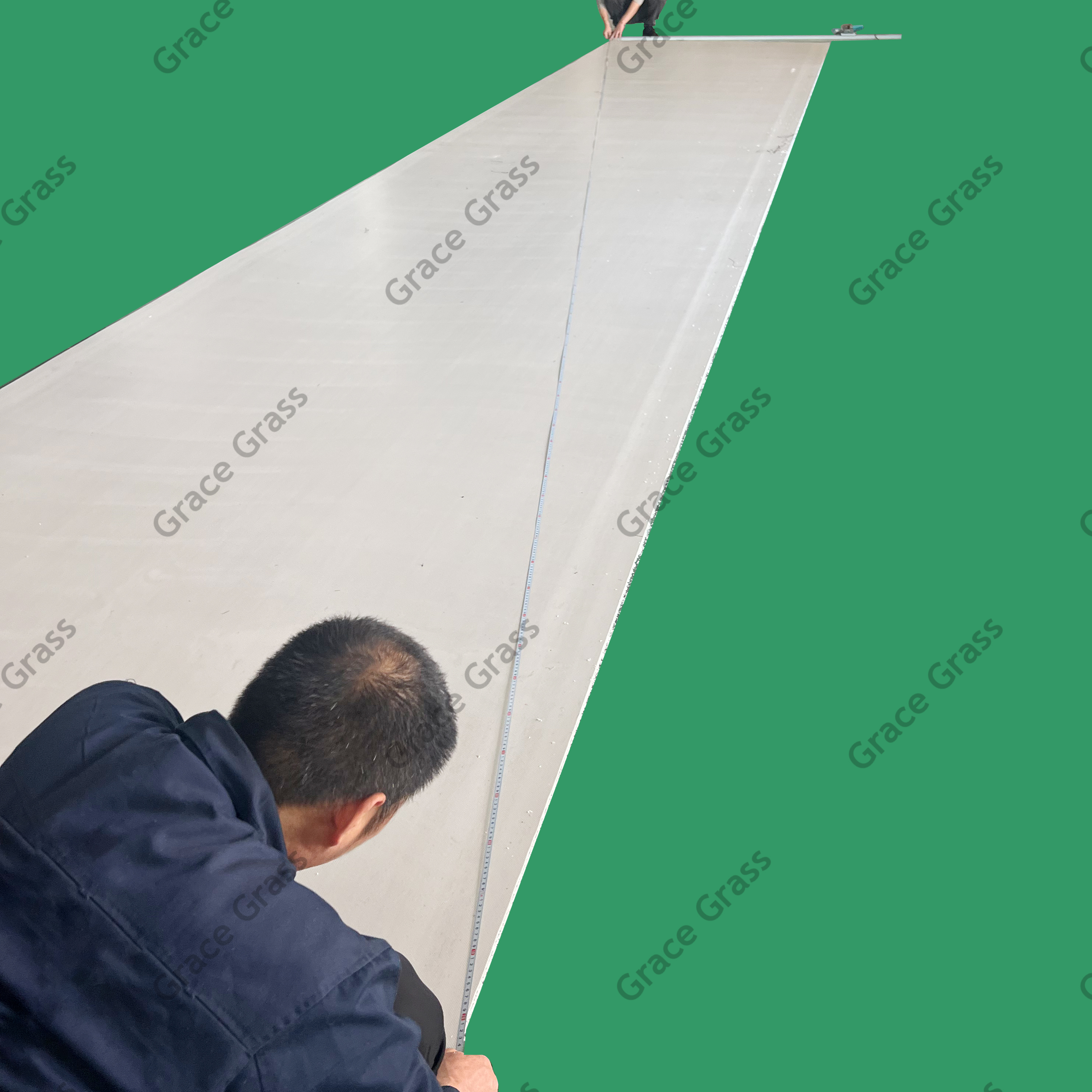 Measuring and marking the perpendicular edge.